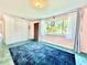 Cozy living room with a large window, stylish curtains, and an inviting atmosphere at 2707 56Th S St, Gulfport, FL 33707