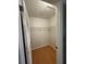 Walk-in closet with shelving, providing plenty of storage space for clothing and personal items at 2900 Grovewood Blvd # A, Palm Harbor, FL 34683