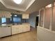 Efficiently designed kitchen with ample counter space, and an adjacent entry space at 2900 Grovewood Blvd # A, Palm Harbor, FL 34683