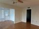 Inviting living room with lots of natural light, featuring a door to the outside and closet for storage at 2900 Grovewood Blvd # A, Palm Harbor, FL 34683