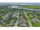 Aerial shot shows the property's location in a neighborhood near the water at 3113 Chamblee Ln, Clearwater, FL 33759
