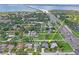 Aerial view showing the home's location in a residential neighborhood near the water at 3113 Chamblee Ln, Clearwater, FL 33759