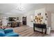 Open concept living and dining area with view into kitchen and breakfast bar at 3113 Chamblee Ln, Clearwater, FL 33759