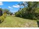 Lawn view of the backyard at 3115 Gina Ct, Holiday, FL 34691