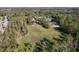 Aerial view of a community soccer field, playground, tennis and volleyball courts at 3241 Evening Breeze Loop, Wesley Chapel, FL 33544