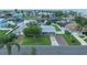 Charming waterfront home with well-maintained lawn, showcasing its appealing exterior and serene neighborhood setting at 3260 Gulfview Dr, Hernando Beach, FL 34607