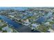 Waterfront neighborhood with homes along canals, showcasing the community's unique coastal living appeal at 3260 Gulfview Dr, Hernando Beach, FL 34607