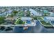 Waterfront property featuring a pool and dock, providing a perfect blend of relaxation and recreation at 3260 Gulfview Dr, Hernando Beach, FL 34607