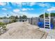 Spacious backyard with an above-ground pool, providing a refreshing outdoor oasis for leisure and recreation at 3260 Gulfview Dr, Hernando Beach, FL 34607