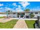 Charming backyard featuring a patio with outdoor seating and a grill, ideal for entertaining guests at 3260 Gulfview Dr, Hernando Beach, FL 34607