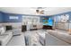 Spacious living room with a TV for entertainment and relaxation at 3260 Gulfview Dr, Hernando Beach, FL 34607