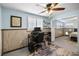 Bedroom furnished as office with natural light, computer desk, and closet at 3260 Gulfview Dr, Hernando Beach, FL 34607