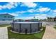 Backyard with outdoor above ground pool and nice view to the canal at 3260 Gulfview Dr, Hernando Beach, FL 34607