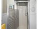 Bathroom shower with frosted glass doors and a handheld shower head at 3260 Gulfview Dr, Hernando Beach, FL 34607