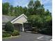 Charming home featuring an attached garage and well-maintained landscaping at 3493 Kings Rd # 106, Palm Harbor, FL 34685