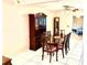 Cozy dining room featuring traditional furnishings with ample space for Gathering gatherings and entertaining at 3575 Lake Highland Dr, Palm Harbor, FL 34683