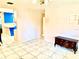 Open dining room with tile flooring and dark wood cabinet at 3575 Lake Highland Dr, Palm Harbor, FL 34683