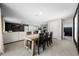 Open-concept design with dining area, seamlessly connected to the living room and kitchen at 36652 N Spanish Rose Dr, Dade City, FL 33525