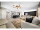 Open floor plan featuring a kitchen with island seating and a spacious living room at 36652 N Spanish Rose Dr, Dade City, FL 33525