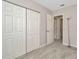 Bedroom offering a closet and a view, and a comfortable area at 3714 N Garrison St, Tampa, FL 33619