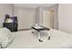 Bedroom featuring a closet and a door and a place to rest at the end of the day at 3714 N Garrison St, Tampa, FL 33619