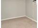 A versatile room with tile flooring, neutral walls, and an AC unit providing a blank canvas at 3714 N Garrison St, Tampa, FL 33619