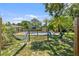 A backyard view shows a pool and hammock, perfect for outdoor relaxation at 4530 Catalonia S Way, St Petersburg, FL 33712