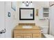 Bathroom with granite top vanity, decorative mirror and wall decorations at 4530 Catalonia S Way, St Petersburg, FL 33712