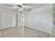 Bright bedroom with tile flooring and double door closet at 4530 Catalonia S Way, St Petersburg, FL 33712