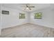 Spacious bedroom features a neutral color palette and two windows for lots of natural light at 4530 Catalonia S Way, St Petersburg, FL 33712