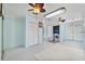Laundry room with sliding mirror closet doors, and a washer at 4530 Catalonia S Way, St Petersburg, FL 33712