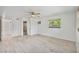 Main bedroom features tile floors, closet space, attached bathroom, and view to the yard at 4530 Catalonia S Way, St Petersburg, FL 33712