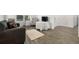 Cozy living room with comfortable seating, neutral tones, and hardwood floors, providing a relaxing atmosphere at 4607 Los Robles Ct, Palmetto, FL 34221