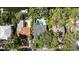 An aerial view shows the lush landscaping and the pool in the backyard of this property at 4722 W Laurel Rd, Tampa, FL 33629