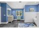 Bathroom showcasing tiled walls, modern vanity, and a luxurious standalone tub at 4722 W Laurel Rd, Tampa, FL 33629