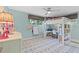 Bright bedroom with playful décor including a loft bed and built in shelves at 4722 W Laurel Rd, Tampa, FL 33629