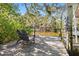 Dock with seating and boat lift providing serene water views at 4722 W Laurel Rd, Tampa, FL 33629