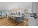 Spacious kitchen featuring a large center island with seating and modern stainless steel appliances at 4722 W Laurel Rd, Tampa, FL 33629