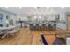 Bright kitchen featuring a large island with seating and stainless steel appliances at 4722 W Laurel Rd, Tampa, FL 33629