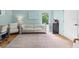 A comfortable living room features a couch, desk, and beverage cooler, perfect for relaxing or entertaining guests at 4722 W Laurel Rd, Tampa, FL 33629