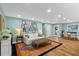 Inviting living room with bright, airy feel, beautiful artwork, and stylish decor at 4722 W Laurel Rd, Tampa, FL 33629