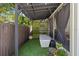 Covered patio with green space and added features at 4722 W Laurel Rd, Tampa, FL 33629