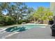 Beautiful backyard pool with patio, grill, and view of the spacious home at 4722 W Laurel Rd, Tampa, FL 33629