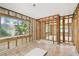 Spacious bedroom ready for renovation with window to view exterior at 5107 W Azeele St, Tampa, FL 33609