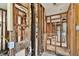 Interior view of unfinished home showing wood framing and bathroom fixtures at 5107 W Azeele St, Tampa, FL 33609