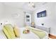 Bright bedroom featuring a comfortable bed, stylish decor, and a mounted television for relaxing entertainment at 5730 Imperial Ky, Tampa, FL 33615