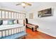 Fun bedroom with bunkbeds, TV, and shuffleboard creating a playful atmosphere for children at 5730 Imperial Ky, Tampa, FL 33615