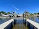 Scenic view of a private boat lift on the water, providing convenient access for boating and waterfront living at 5730 Imperial Ky, Tampa, FL 33615