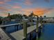 Waterfront property featuring a private boat lift, offering convenient access to boating and scenic water views at 5730 Imperial Ky, Tampa, FL 33615
