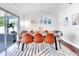 Stylish dining room with a large table, modern chairs, and plenty of natural light at 5730 Imperial Ky, Tampa, FL 33615